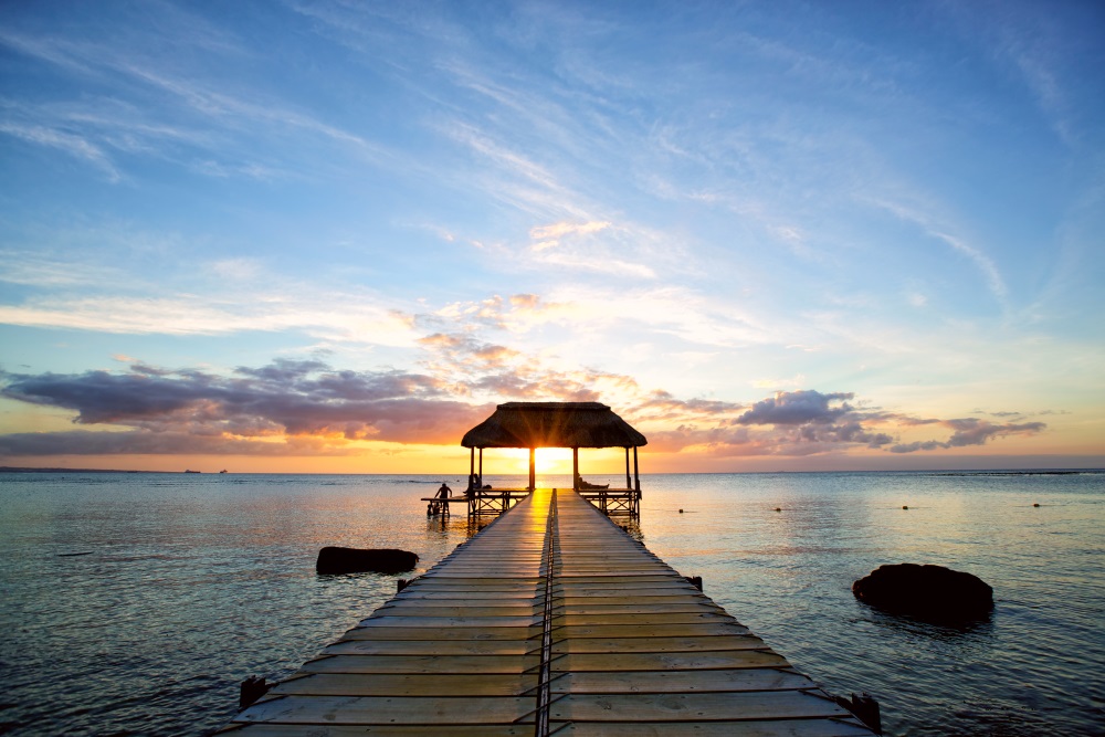 Mauritius Jetty silhouette against beautiful sunset in Mauritius Island